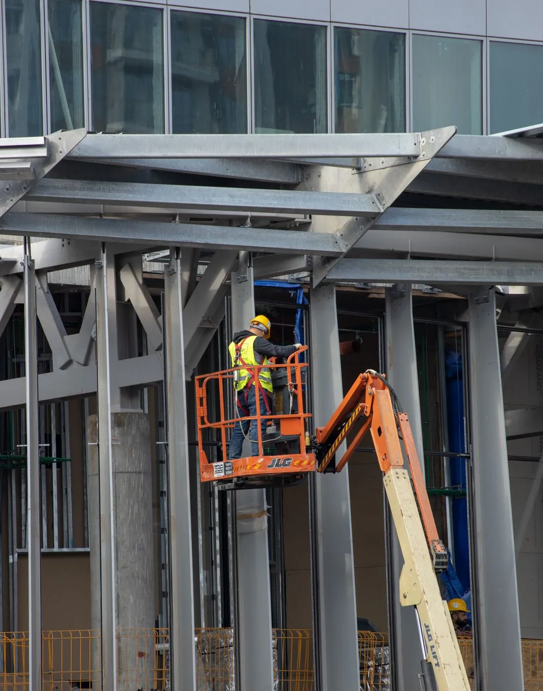 L&H crew member working from a lift inside a steel structure