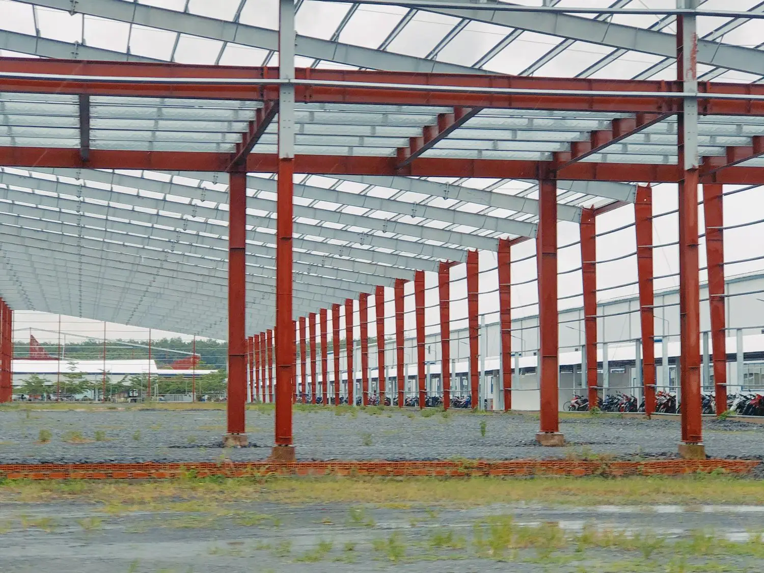 Red structural steel frame of an industrial building